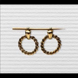 Sarah Coventry gold tone clip-on earrings. Hoop design.